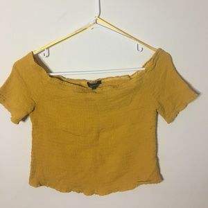 dark yellow ruffled cropped tee off the shoulder